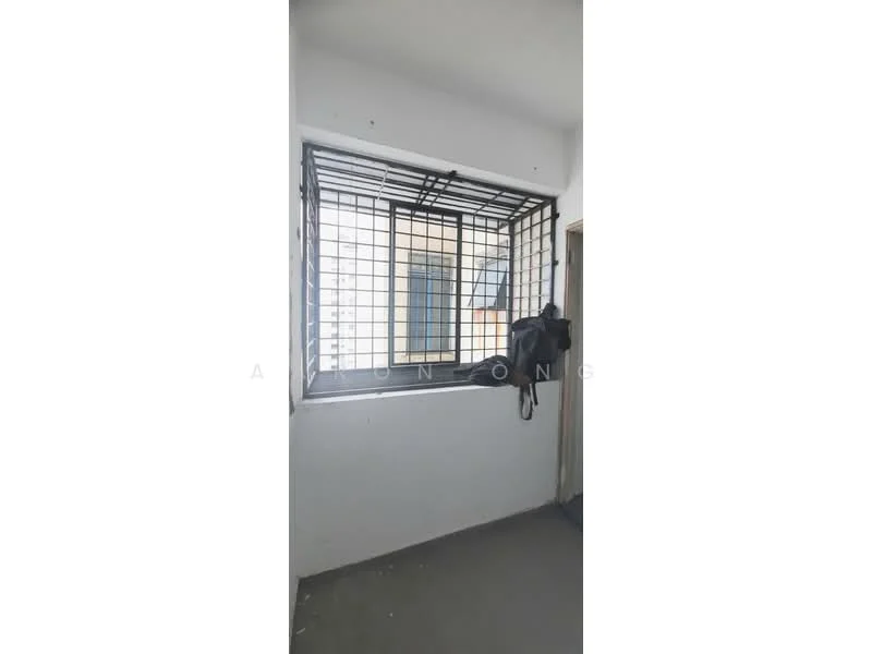 Room features: window with security grille, grey wall, concrete flooring, corner window, natural light, minimal decor; style: minimalist.