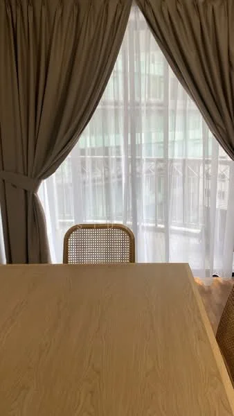 Dining features: light wood dining table, 4 rattan dining chairs, floor-to-ceiling windows, sheer white curtains, grey drapes, wooden flooring; style: modern; view: city.