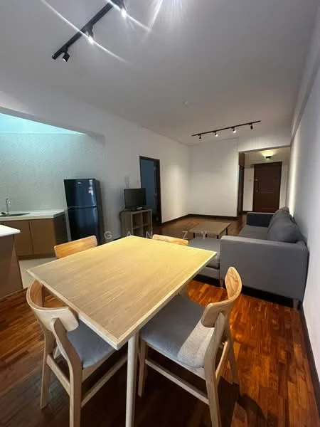 Dining features: wooden dining table, 4 dining chairs, recessed downlights, laminate flooring, white painted walls, open layout to living area; style: modern. Living features: grey fabric sofa, laminate flooring, recessed downlights, white painted walls, wall-mounted TV, open layout to dining area; style: modern. Kitchen features: stainless-steel fridge, laminate cabinetry, countertop, open layout to dining area; style: modern.