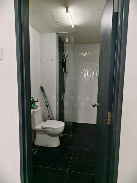 Bathroom features: white toilet, glass shower enclosure, chrome shower head, black tile flooring, white tiled walls, ceiling light fixture, cleaning supplies on floor, shower hose, towel rack, mirror, door with handle; style: modern.
