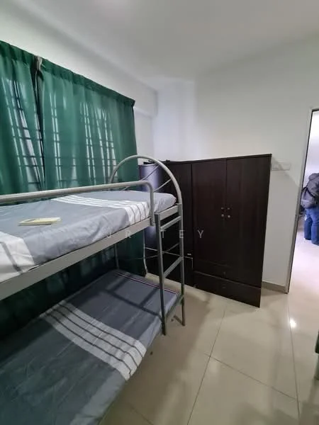 Bedroom features: bunk bed with metal frame, mattress on top and bottom bunk, green curtains, built-in wardrobe with dark wood finish, cream tiled flooring, white painted walls, light fixture on ceiling, doorway leading to another room; style: modern.