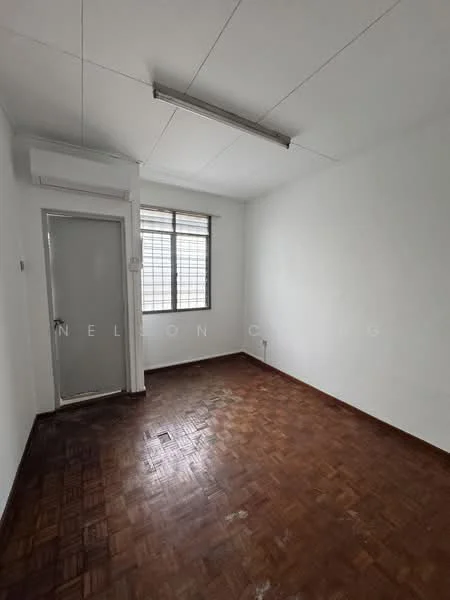 Room features: white painted walls, parquet wood flooring, window with grid pattern, 1 wall-mounted split AC, ceiling light fixture, door leading to outside, corner power outlet; style: minimalist.
