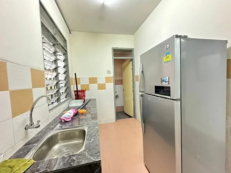 Kitchen features: stainless-steel sink, chrome pull-down faucet, marble countertop, white tiled backsplash, grey tiled walls, light beige tiled walls, ceramic tile flooring, freestanding fridge, window with horizontal slats, kitchen cabinet under sink.