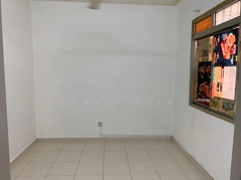 Room features: white painted walls, tile flooring, single window, no visible furniture, plain ceiling, light fixture, power outlet, empty space.