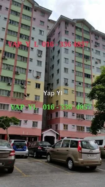 Exterior type: low-rise apartment block; features: multi-storey building, painted facade in pastel colors, balconies on each floor, visible air conditioning units, parking lot in front, landscaped area with trees, entrance with awning; style: modern.