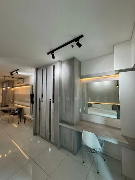 Room features: white tiled flooring, grey wooden panelled feature wall, built-in wardrobe with sliding doors, desk with mirror, white chair, track lighting, air conditioning unit, bed visible in background; style: modern.