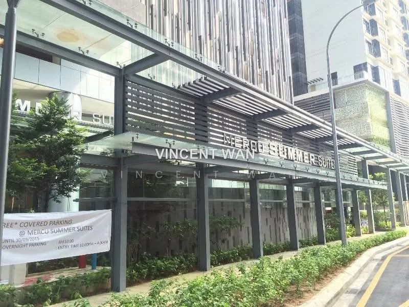 Exterior type: serviced apartment; features: glass facade, metal awning, landscaped greenery, covered parking area, signage for Mercus Summer Suites, modern architectural design, paved walkway, street view access; style: modern.