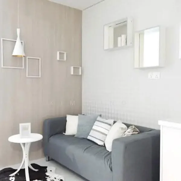 Living features: grey fabric sofa, white round side table, pendant light fixture, decorative mirrors, striped throw pillows, wall-mounted shelves, light wood accent wall, white walls, black and white area rug; style: modern.