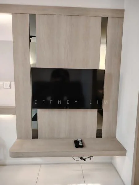 Living features: wall-mounted TV, light wood feature wall, floating TV console, remote control, minimalist design, integrated lighting, smooth white wall, neutral color palette; style: modern.