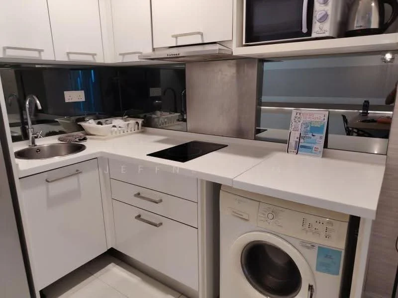 Kitchen features: white cabinetry, stainless-steel single-bowl sink, chrome pull-down faucet, built-in induction cooktop, microwave, stainless-steel kettle, front-load washing machine, white countertop, mirror backsplash, open shelving, under-cabinet lighting; style: modern.