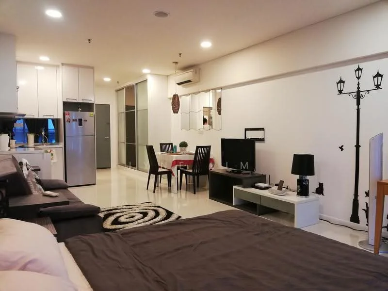 Living features: grey wall paint, white ceiling, recessed downlights, 3-seater fabric sofa in dark grey, black floor lamp, TV console, wall-mounted TV, coffee table, area rug with geometric pattern, dining table for 4 with white surface, 4 dining chairs, sliding glass door, fridge, mirror, decorative wall art; style: modern.