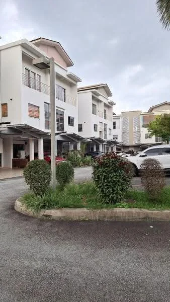 Exterior type: linked terrace house; features: white painted facade, flat roof, 2-storey building, manicured lawn, hedges, driveway with interlocking pavers, parking spaces visible, surrounded by greenery; style: modern.