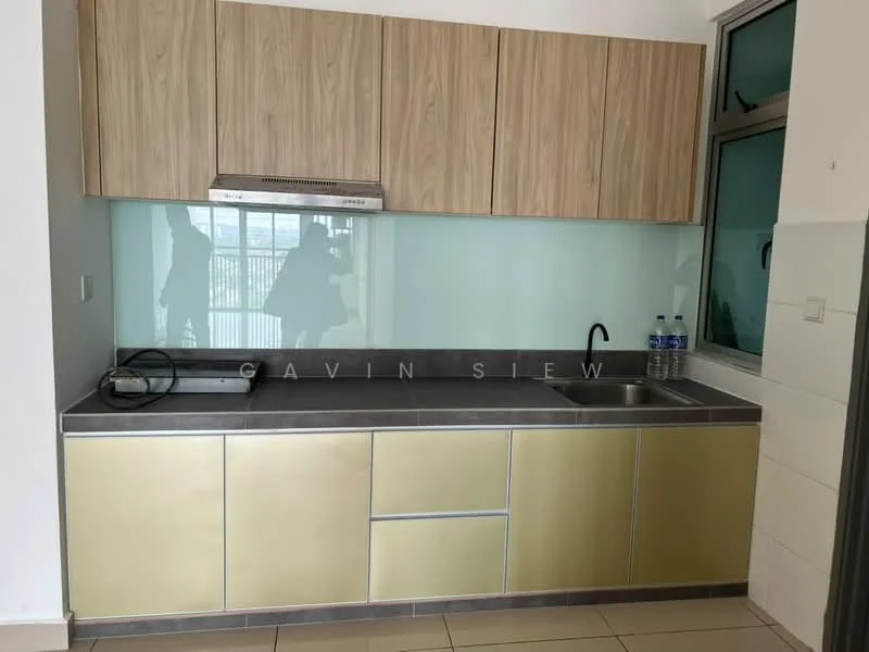 Kitchen features: laminate cabinetry in light wood finish, golden metallic lower cabinetry, grey countertop, single-bowl stainless-steel sink, chrome pull-down faucet, glass backsplash, built-in range hood, two bottles of water on countertop, tile flooring, window with view, minimalist design; style: modern; view: city.
