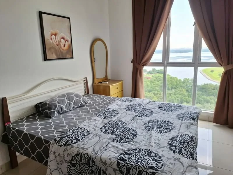 Bedroom features: queen-size bed with patterned bedding, decorative throw pillows, framed artwork on wall, floor-to-ceiling windows, curtains in brown, wooden bedside table, mirror on the wall, tile flooring, view of greenery and water; style: modern; view: garden.