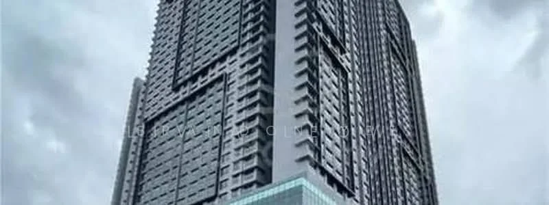 Exterior type: high-rise condominium; features: glass curtain wall, grey painted facade, recessed balconies, vertical fins, feature lighting at night; style: modern.