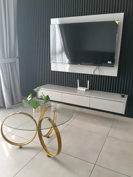 Living features: black accent wall with vertical panels, flat-screen TV mounted on wall, light-colored media console, glass coffee table with gold circular base, ceramic floor tiles, grey curtains, indoor plant in decorative pot, wall-mounted router; style: modern.
