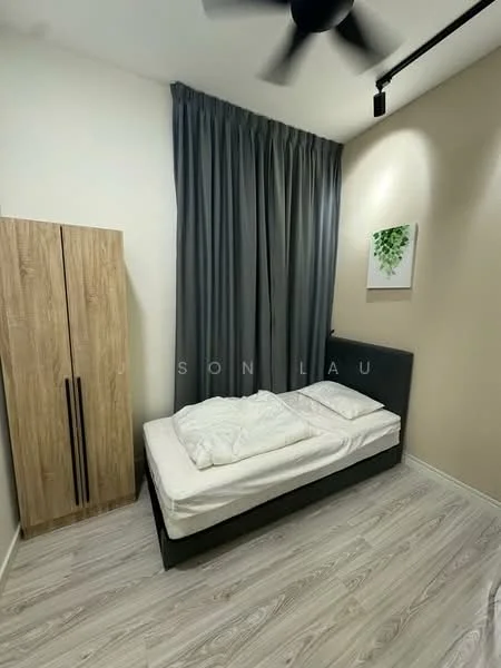 Bedroom features: single bed, white bedding, wooden wardrobe with two doors, grey curtains, light wood laminate flooring, wall-mounted artwork with green plant design, black headboard, ceiling fan; style: modern.