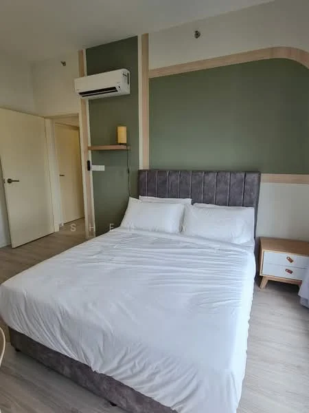 Bedroom features: queen-size bed with white bedding, upholstered headboard in grey, light wood bedside table, wall-mounted shelf, wall-mounted air conditioning unit, green accent wall, light wood flooring, white painted walls, door leading to hallway; style: modern.