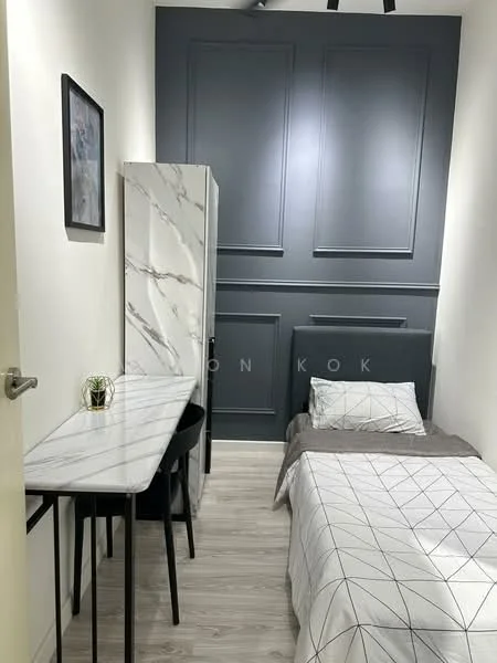 Bedroom features: single bed with grey bedding, marble-patterned desk, black metal chair, grey accent wall with paneling, light wood flooring, framed artwork on wall, built-in wardrobe with marble finish, ceiling fan; style: modern.