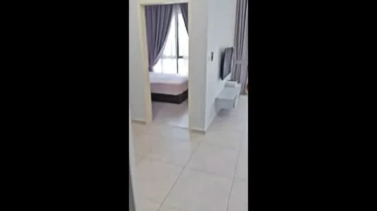 Room features: white painted walls, light-colored floor tiles, floor-to-ceiling windows, curtains in light purple, wall-mounted TV, minimalist TV console, bed visible in background, queen-size bed with light bedding; style: modern.