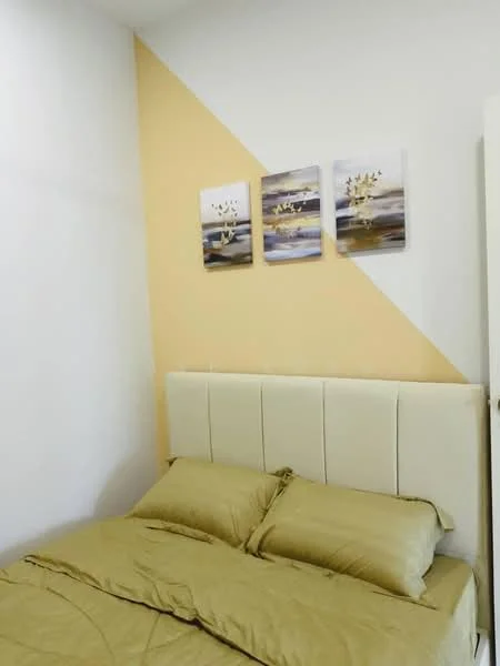 Bedroom features: cream painted walls, yellow accent wall, upholstered headboard, king-size bed with beige bedding, framed artwork on wall, wooden flooring, built-in wardrobe; style: modern.
