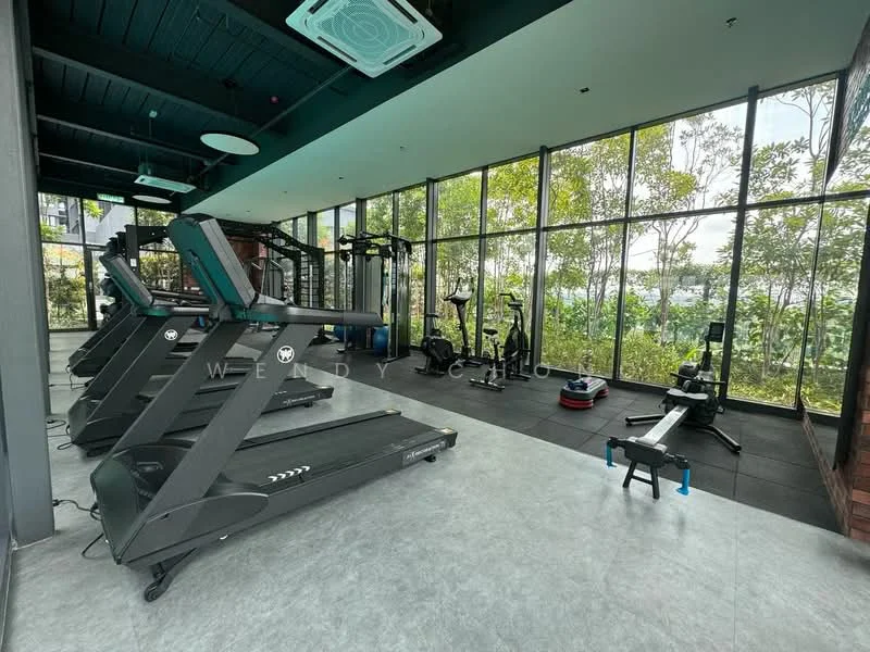 Room features: treadmills, elliptical machine, stationary bike, rowing machine, large floor-to-ceiling windows, greenery view outside, rubber flooring, ceiling-mounted air conditioning unit, wall-mounted mirrors, exercise mats, weights, water cooler; style: modern; view: garden.