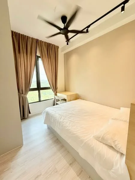 Bedroom features: queen-size bed with white bedding, wooden bedside table, floor-to-ceiling window, curtains in beige, light-colored laminate flooring, 5-blade ceiling fan, wall-mounted light fixture, neutral painted walls; style: modern; view: garden.