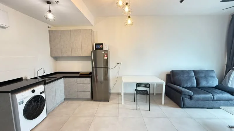 Kitchen features: single-bowl stainless-steel sink, chrome pull-down faucet, black countertop, grey cabinetry, built-in refrigerator, freestanding washing machine; style: modern. Living features: 3-seater fabric sofa in grey, white dining table, black dining chair, pendant lighting, tile flooring, large window with curtains; style: modern.