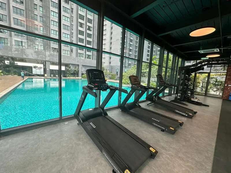 Gym features: treadmills, large floor-to-ceiling windows, view of swimming pool, grey vinyl flooring, black gym equipment, green landscaping outside, modern lighting fixtures, open layout; style: modern; view: pool.
