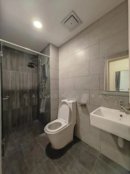Bathroom features: walk-in shower with glass enclosure, rain shower head, handheld shower, one-piece toilet, wall-mounted sink, chrome basin mixer, grey tile flooring, grey wall tiles, white sink, mirror above sink, recessed ceiling lights, exhaust fan; style: modern.