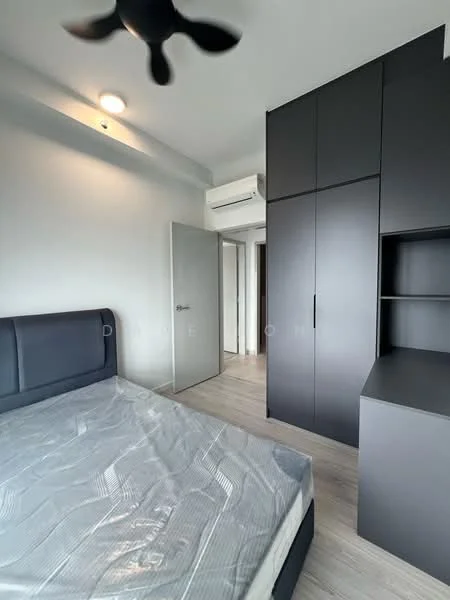Bedroom features: queen-size bed, upholstered headboard, black built-in wardrobe, wooden flooring, 5-blade ceiling fan, wall-mounted split AC, white painted walls, natural light from window; style: modern.