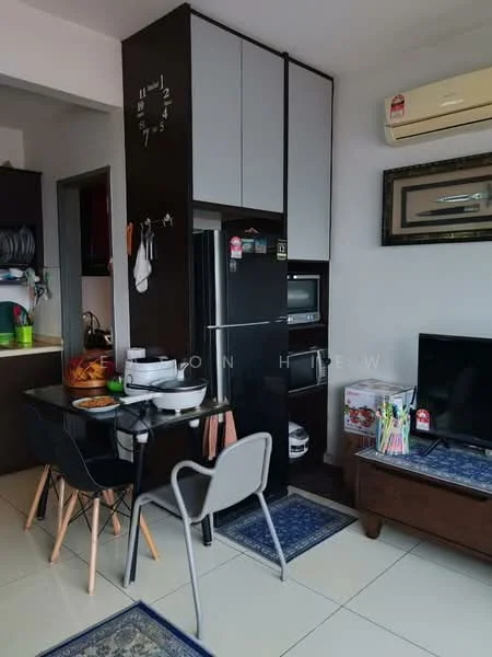 Kitchen features: black fridge, built-in microwave, stainless-steel sink, chrome pull-down faucet, green countertop, white upper cabinets, dark lower cabinets, wall-mounted air conditioning unit, dining table with black chairs, area rug, wall clock, decorative artwork; style: modern.