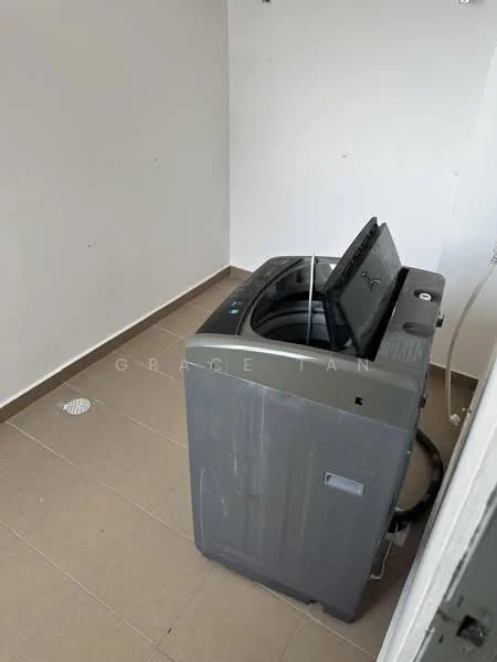 Laundry features: top-load washing machine in grey, tile flooring in light brown, white painted walls, drainage floor grate.