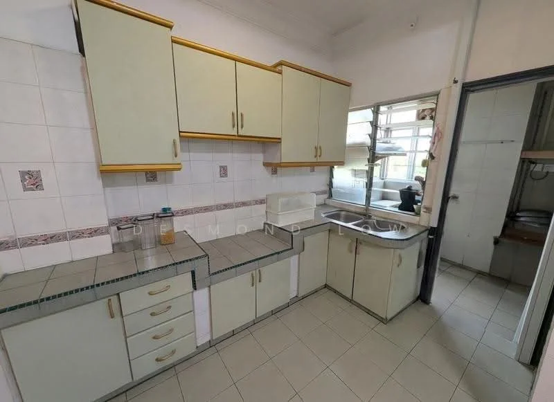 Kitchen features: green cabinetry with gold handles, white tiled backsplash, grey countertop, single-bowl stainless-steel sink, chrome faucet, built-in oven, ceramic tile flooring, window with natural light, wall-mounted shelves, multiple drawers and cabinets.