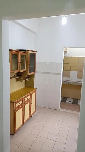 Kitchen features: wooden cabinetry with glass doors, yellow countertop, white tiled walls, light-colored floor tiles, single-bowl stainless-steel sink, wall-mounted light fixture, open layout to adjacent area.