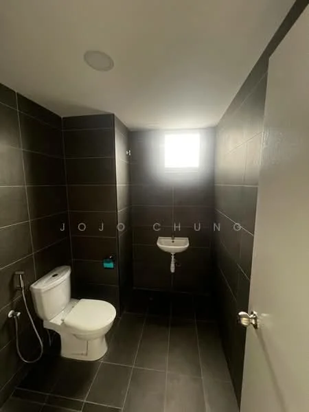 Bathroom features: one-piece toilet, wall-mounted sink, chrome basin mixer, shower hose, tile flooring, dark grey wall tiles, ceiling light, window for natural light; style: modern.