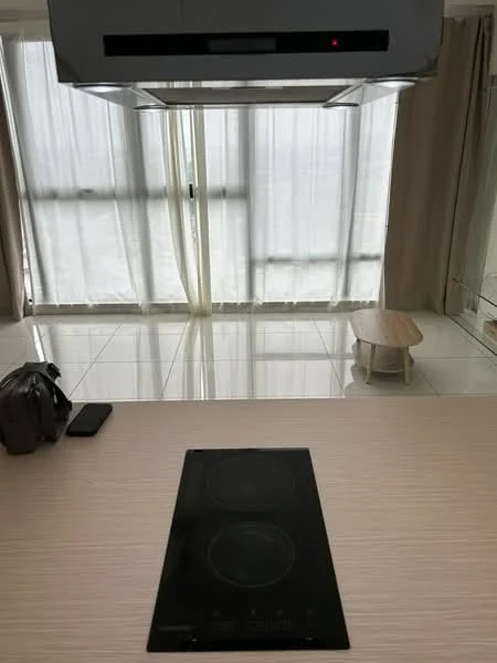 Kitchen features: induction cooktop, stainless-steel range hood, light wood countertop, white cabinetry, white tiled flooring, floor-to-ceiling windows, sheer curtains, small round dining table, backlit wall, minimalist design; style: modern; view: city.