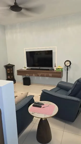 Living features: light blue painted walls, white ceiling, recessed downlights, wall-mounted TV, wooden TV console, black leather recliner chair, round coffee table with wooden base, area rug, decorative wall clock, decorative cabinet, remote control on coffee table; style: modern.