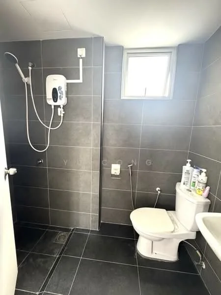 Bathroom features: grey tiled walls, black tiled flooring, shower with wall-mounted water heater, toilet, sink, window, toiletries on sink, showerhead; style: modern.