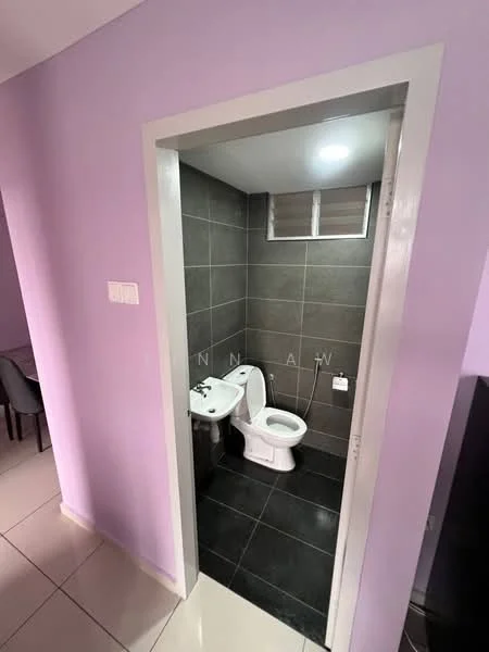 Bathroom features: purple painted walls, grey tiled walls, black tiled flooring, one-piece toilet, wall-mounted sink, window for natural light, ceiling light, toilet paper holder; style: modern.