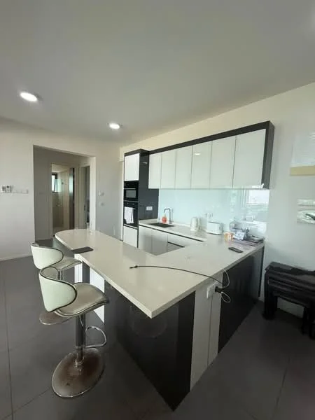 Kitchen features: white cabinetry, black countertop, stainless-steel appliances, built-in oven, microwave, single-bowl stainless-steel sink, chrome pull-down faucet, bar seating with two stools, glass backsplash, recessed downlights, grey tile flooring; style: modern.