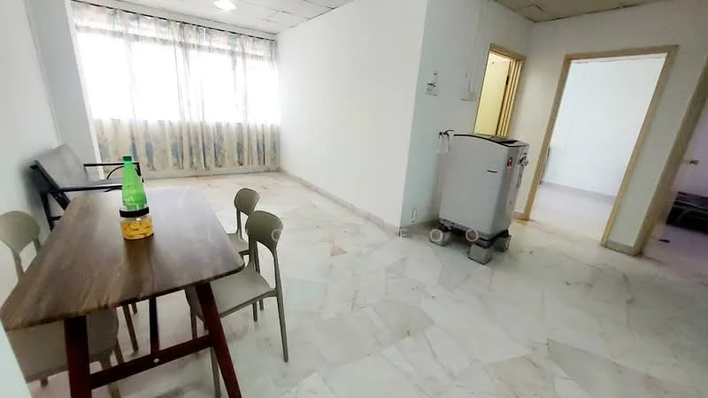 Room features: marble flooring, white painted walls, large windows with sheer curtains, dining table with wooden surface, 4 dining chairs, refrigerator, ceiling lights.