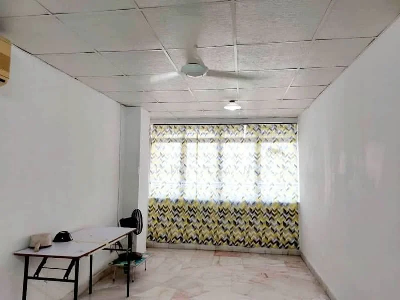 Room features: white painted walls, marble flooring, ceiling fan, window with sheer curtains, table, chair, standing fan, recessed ceiling lights.