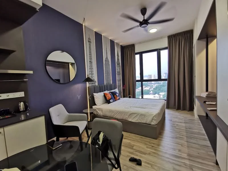 Bedroom features: king-size bed, upholstered headboard, floor-to-ceiling windows, city view, grey accent wall, wooden flooring, 5-blade ceiling fan, decorative mirror, built-in wardrobe, study desk, area rug; style: modern; view: city. Kitchen features: black cabinetry, white countertop, stainless-steel kettle, microwave, built-in stove, open shelving; style: modern. Dining features: round dining table, 2 dining chairs; style: modern.