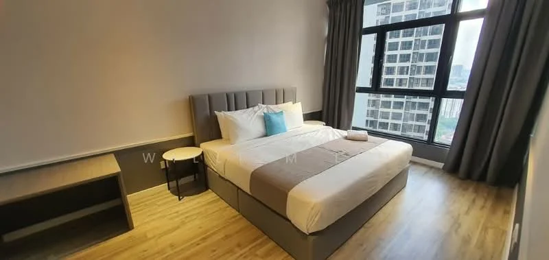 Bedroom features: king-size bed, upholstered headboard, white bedding, decorative blue cushion, nightstand with lamp, wooden flooring, floor-to-ceiling windows, grey curtains, study desk, wall-mounted artwork; style: modern; view: city.