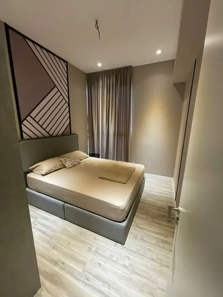 Bedroom features: queen-size bed, upholstered headboard, decorative pillows, wooden flooring, floor-to-ceiling window with sheer curtains, wall-mounted light fixture, geometric accent wall, neutral wall color; style: modern.
