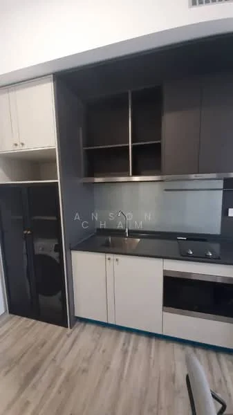 Kitchen features: black refrigerator, built-in oven, 4-burner gas hob, single-bowl stainless-steel sink, chrome pull-down faucet, white cabinetry with upper glass-front cabinets, grey countertop, backsplash with glass panel, wood laminate flooring, wall-mounted microwave, ventilation hood; style: modern.