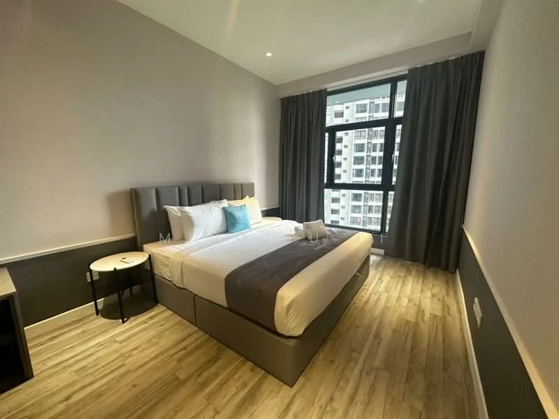 Bedroom features: king-size bed, upholstered headboard, white bedding, decorative blue cushion, nightstand with lamp, wooden flooring, floor-to-ceiling window, grey curtains, wall-mounted artwork, built-in wardrobe, study desk, chair; style: modern; view: city.