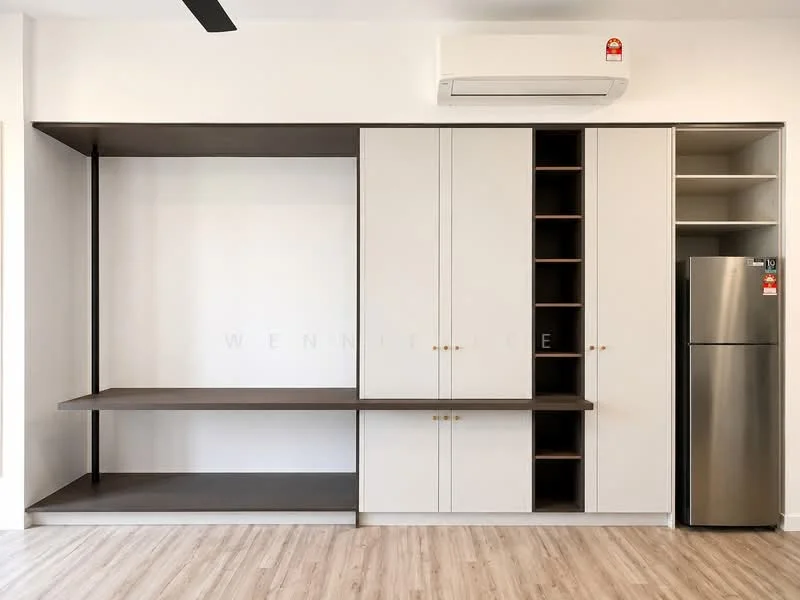 Room features: built-in cabinetry with white finish, open shelving, dark wood countertop, stainless-steel fridge, wall-mounted split AC, laminate flooring, light-colored walls, gold hardware on cabinets; style: modern.