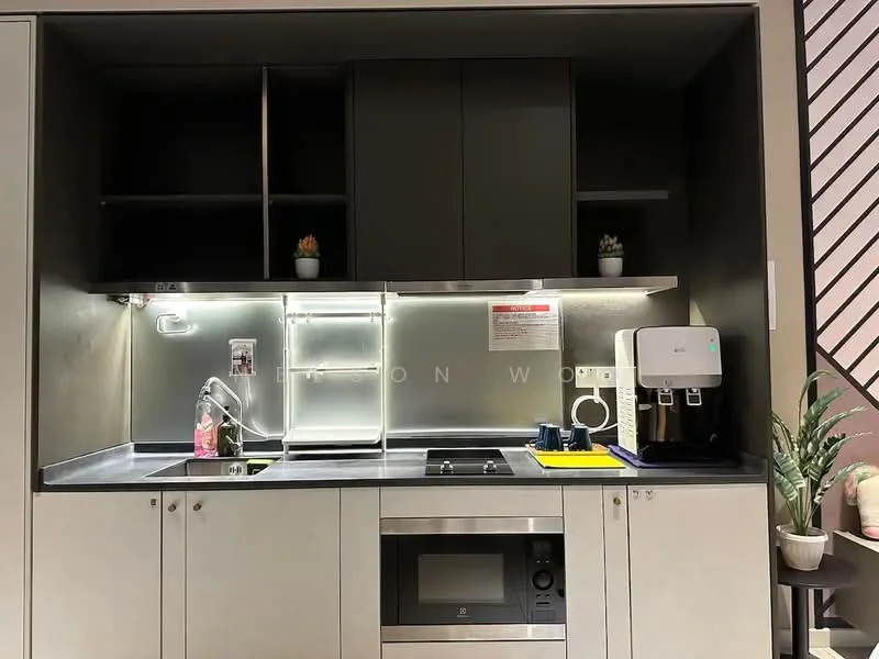Kitchen features: grey cabinetry, black countertop, stainless-steel sink, chrome pull-down faucet, built-in microwave, freestanding coffee machine, refrigerator, under-cabinet lighting, open shelving, decorative plants; style: modern.
